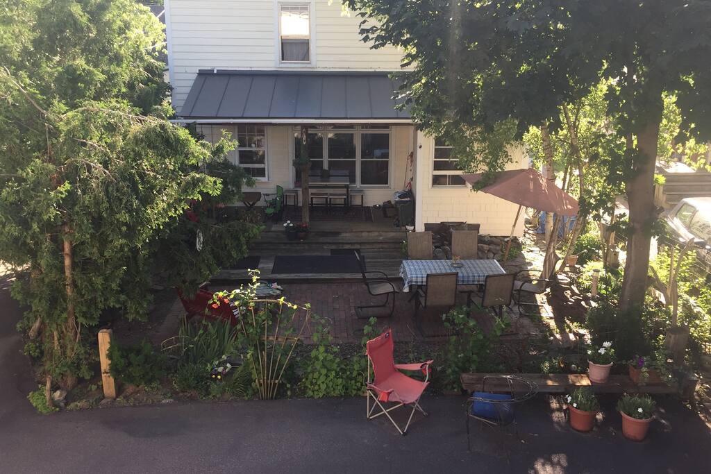 View of common court yard from outside porch.