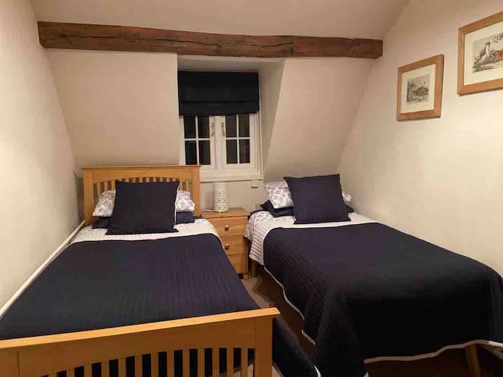 This is the 3rd room, it’s a mezzanine and you access the master bedroom through this room however it has two single beds that can sleep two adults 