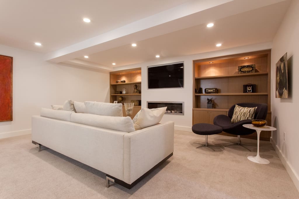 This is your private living room. It is much more than just a room. It is an entire floor 800 square foot sweet privately set on its own lower level of the home.
