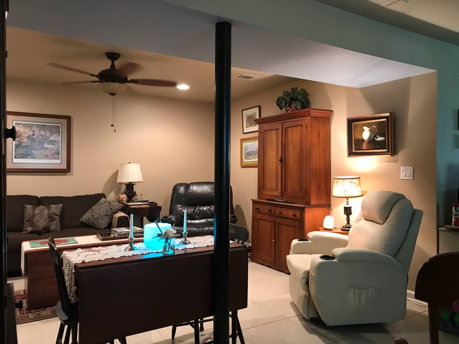 Private living room with pull out sleeper sofa.