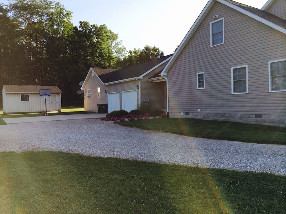 Driveway & garage - park to left in visitor parking