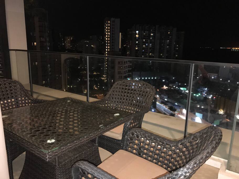 Care for an outdoor dining experience with a view of the sea at the room balcony