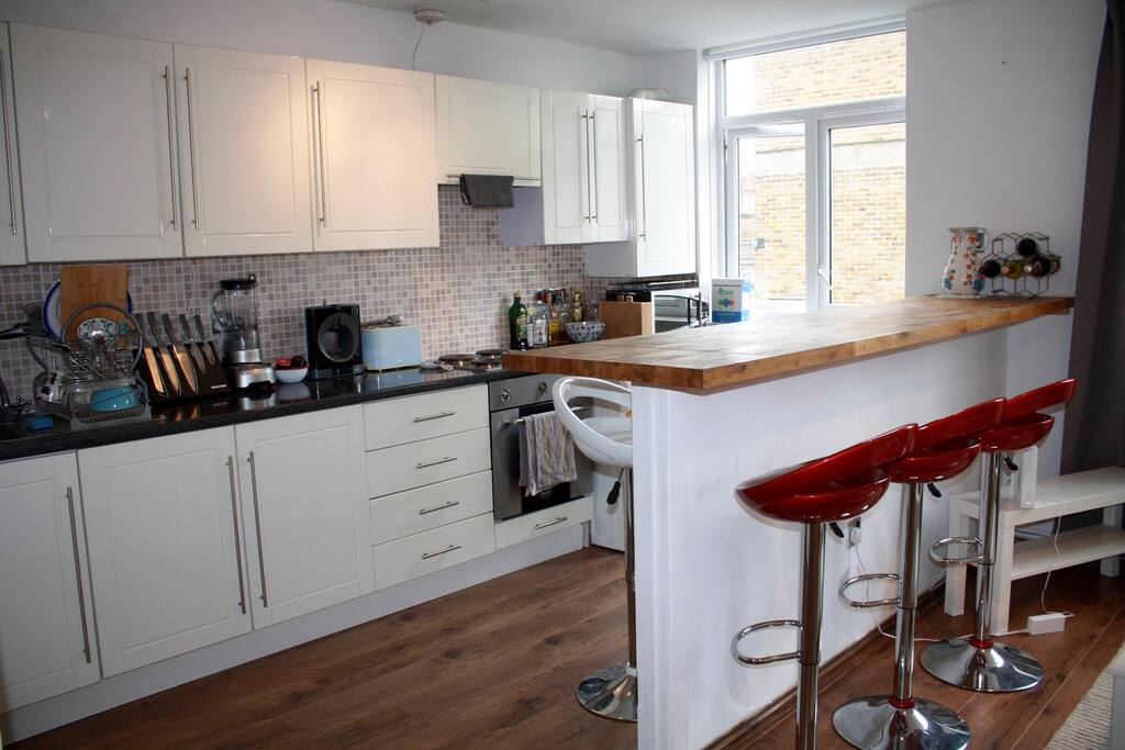 The large wooden table top is perfect for cooking and dining