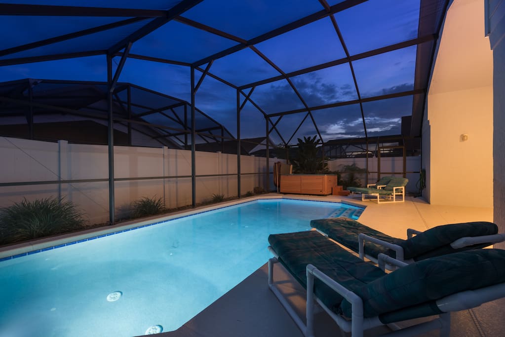 By night, the pool lighting lures you outdoors.