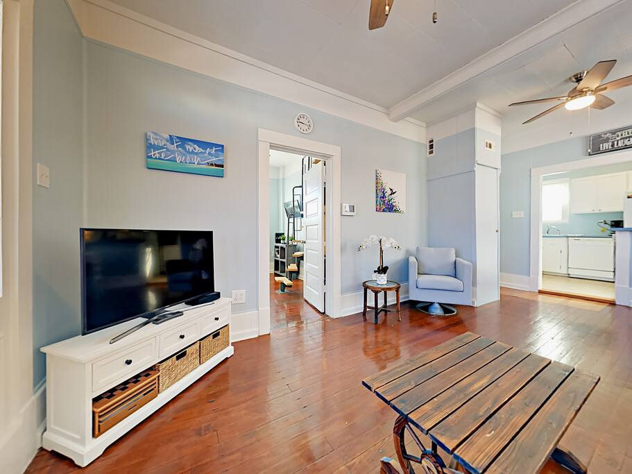 The living room offers comfortable seating for pre-dinner drinks or for unwinding with a movie on the 40” flat screen TV.