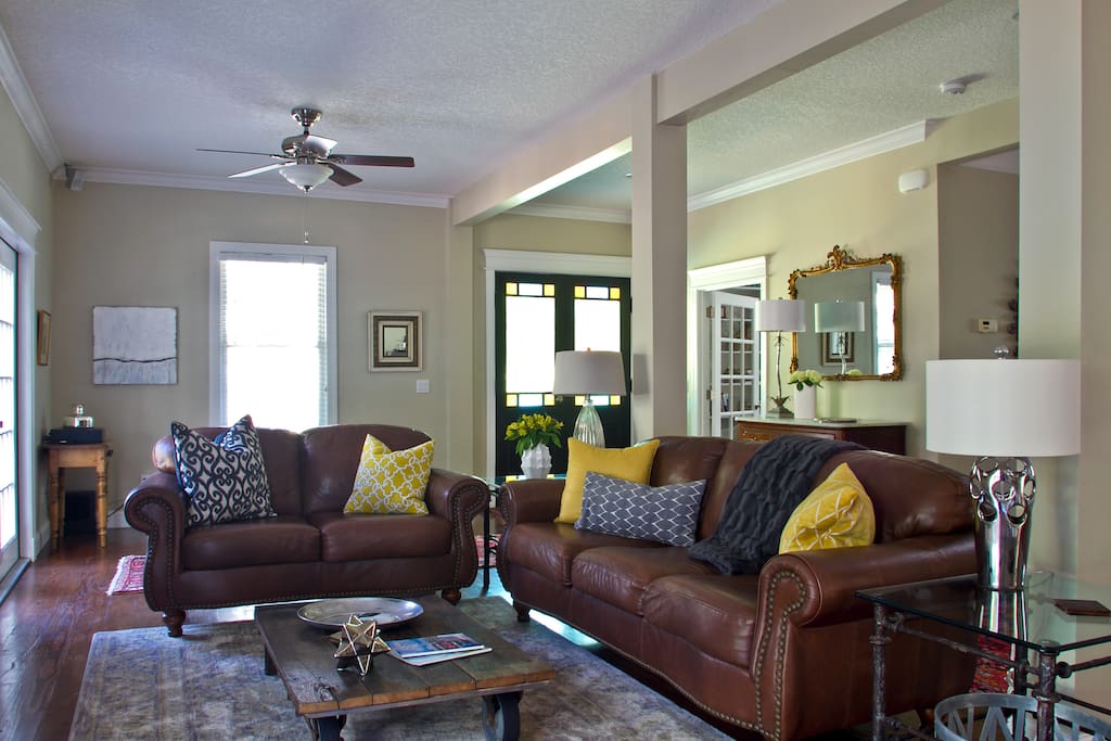Enjoy the spacious, open plan living area with French doors to the large deck and secluded garden.