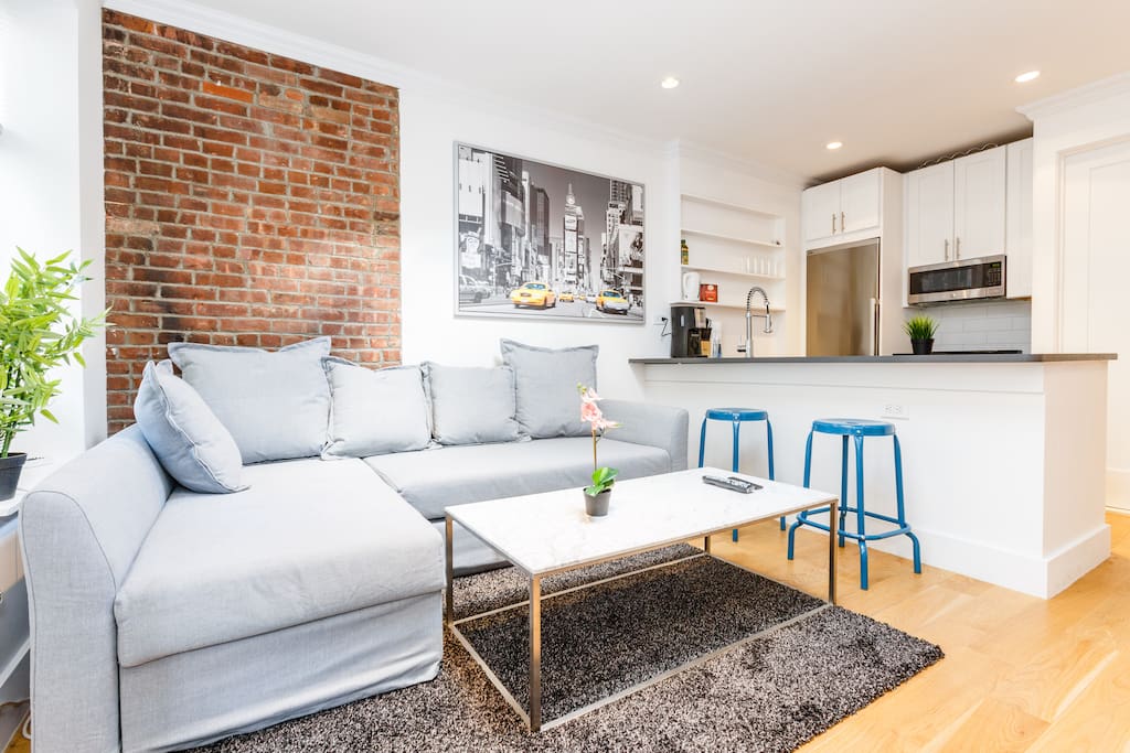 Recessed lighting, updated furnishings and exposed brick show you the best NYC has to offer!