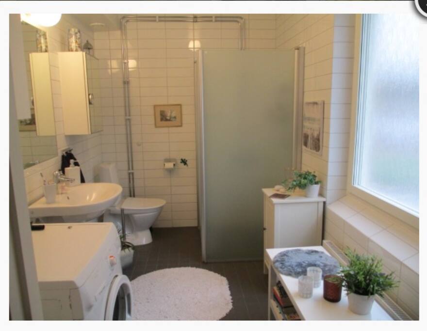 The bathroom with a washmachine