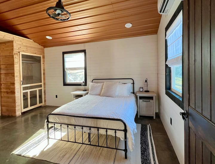 Master on main with Queen bed, two closets, and dresser. Nightstands offer plenty of charging outlets for all your devices.
