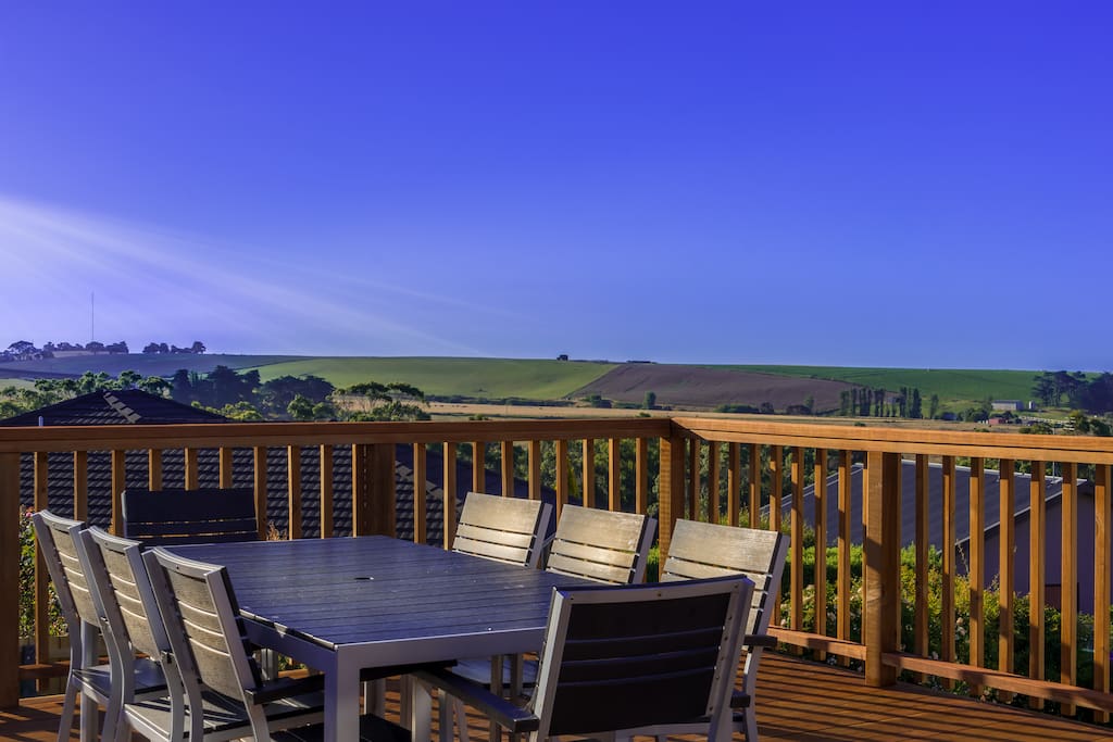 Bask in the afternoon and evening sun on the back deck and enjoy eats and drinks