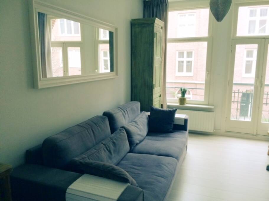 living room with french balcony