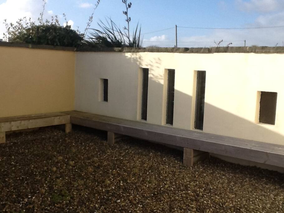 Cosy side area which is a sun trap