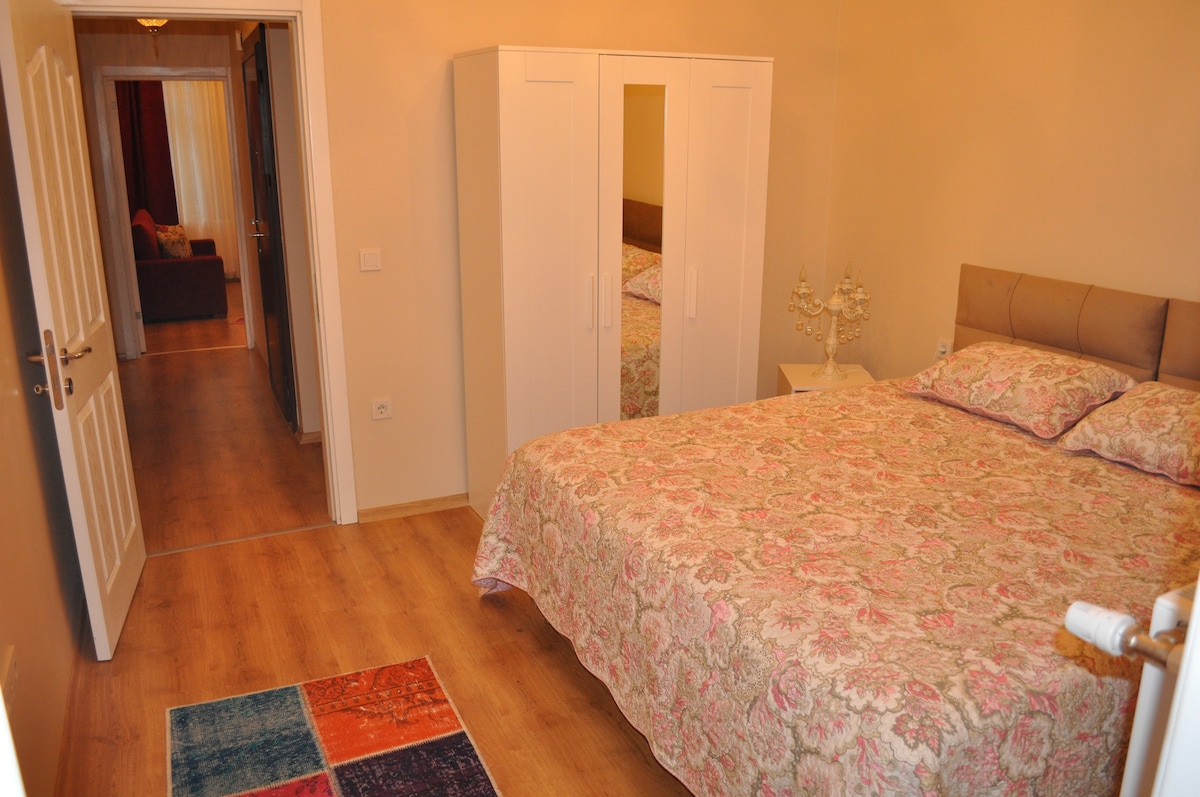 Spálňa má dve samostatné postele alebo posteľ veľkosti King.