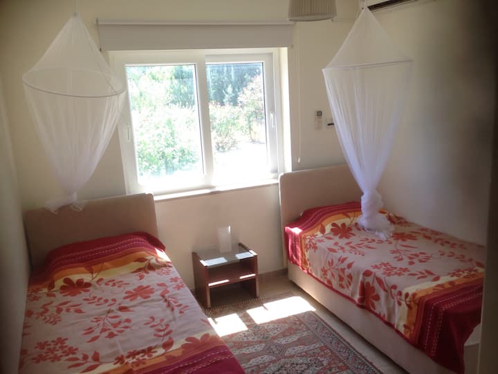 Downstairs twin room. Full AC.