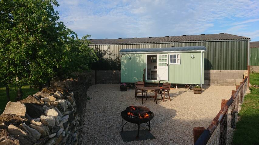 Shepherd's hut on Cotswold Farm near Castle Combe