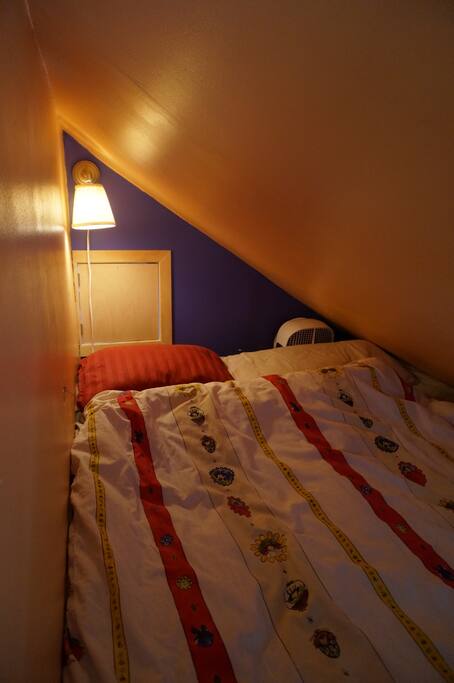 The snug-
Custom
double foam loft bed .
With 8 step ladder and
"porthole"
Peek a boo Window