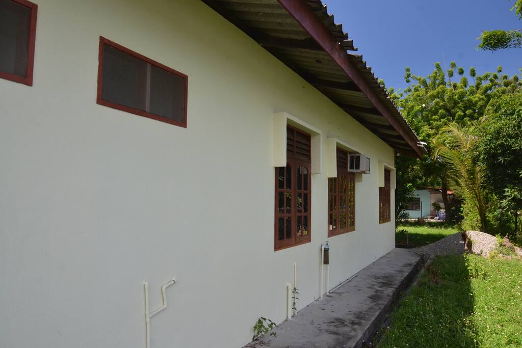 Along side the house