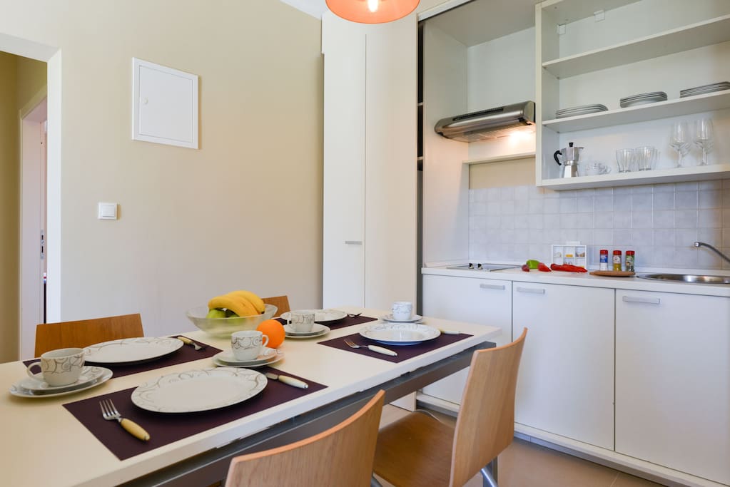 Dining table and kitchen