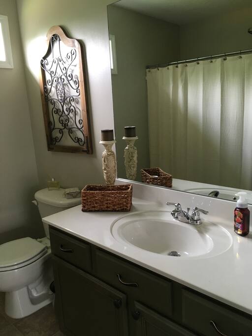 Private bath, loaded with big fluffy towels. Shower tub combo and extra supplies if you forget something.