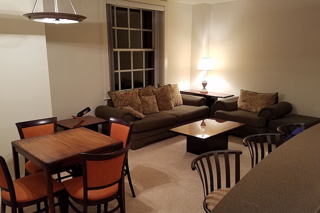 Bar, dining, and living area (furniture arrangement most up to date in this photo!)