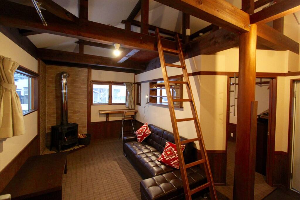 Cosy fireplace and lounge room - sofa can be turned into a bed if need be