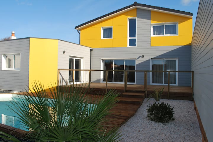 House with a pool near the beach