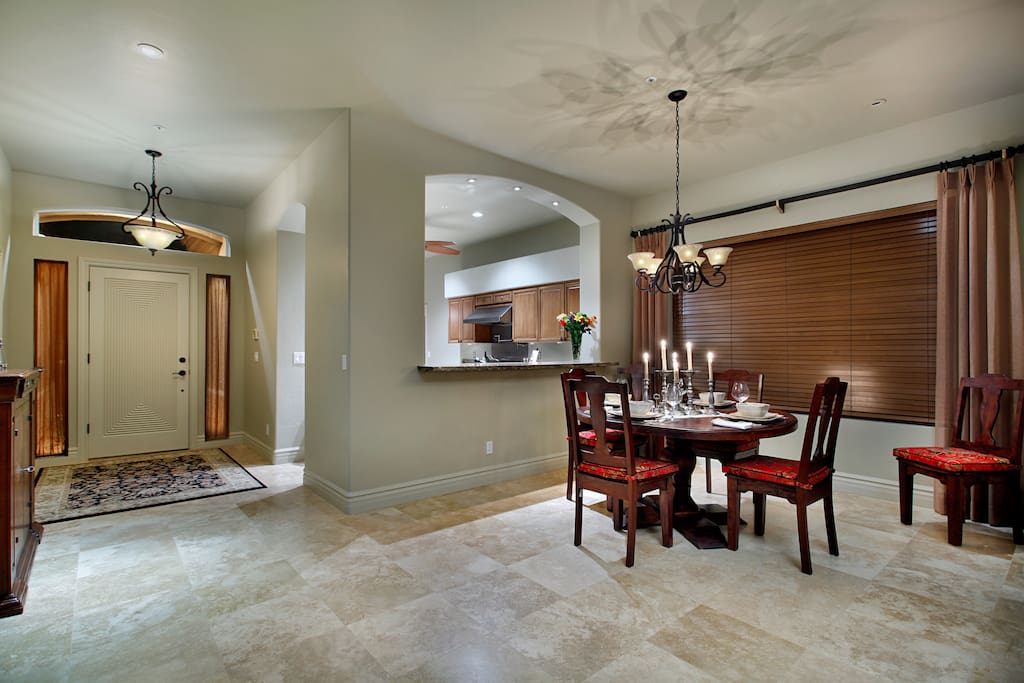 Large kitchen with granite countertops furnished with exceptional quality serving pieces, cutlery, dishes, silverware, glassware, and small appliances, etc and stocked with staples. All new appliances include a Viking gas 6 burner cooktop, and dual wall ovens.