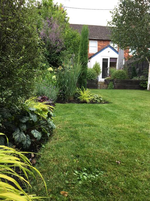 Stunning garden with alfresco dining deck