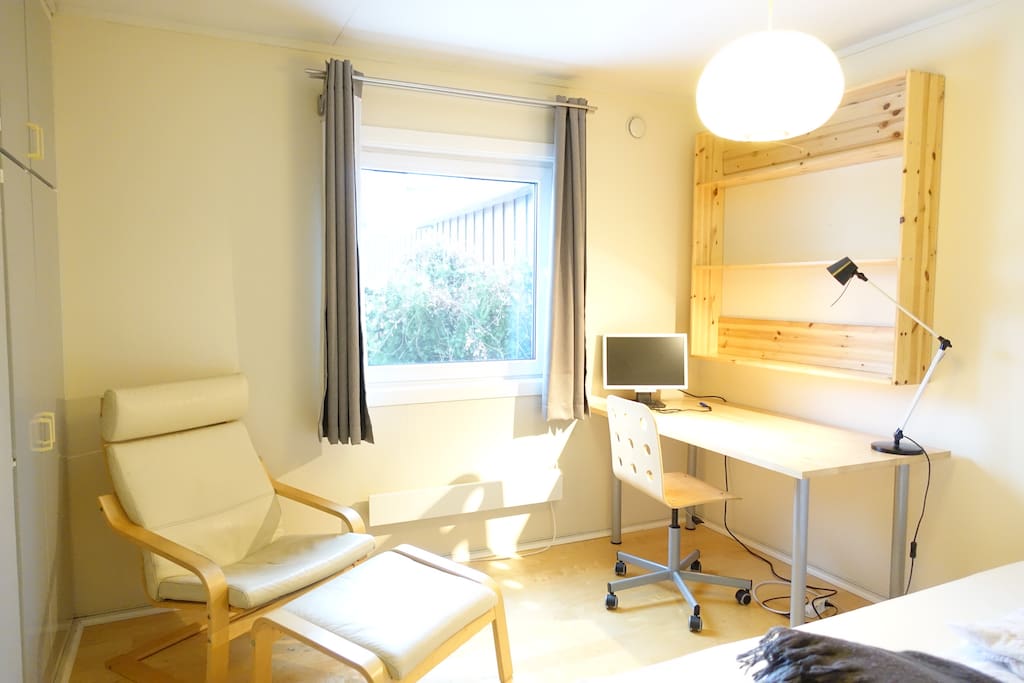 There's also an armchair in the room.