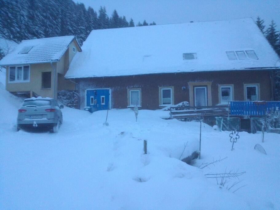 snowy winter picture of the house