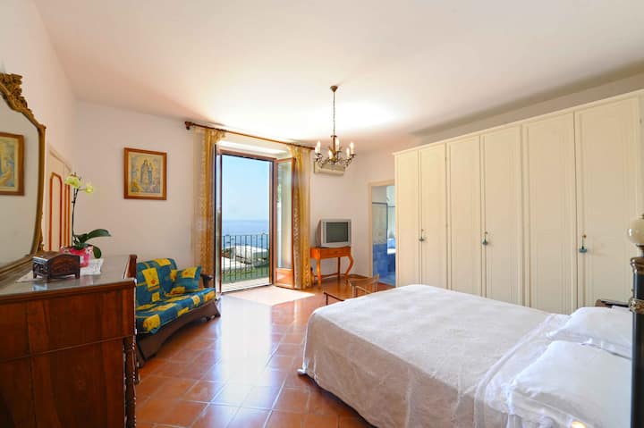 Bedroom with village and sea view