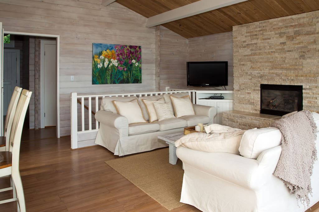 Cozy living room with thermostat-controlled gas fireplace.