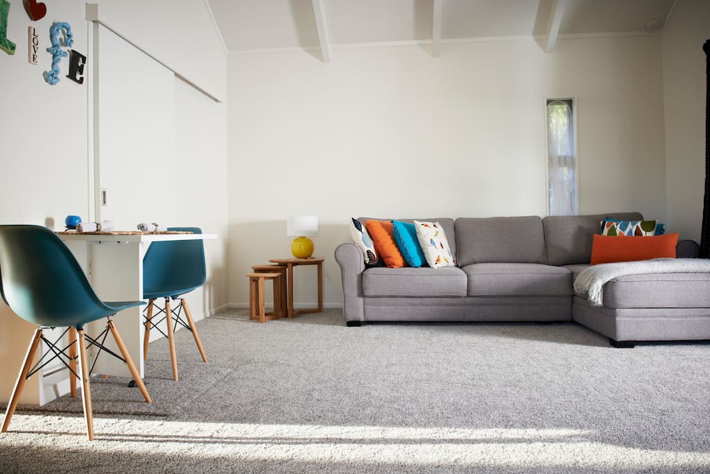 Spacious, comfortable lounge, deck leading to forest edge spa
