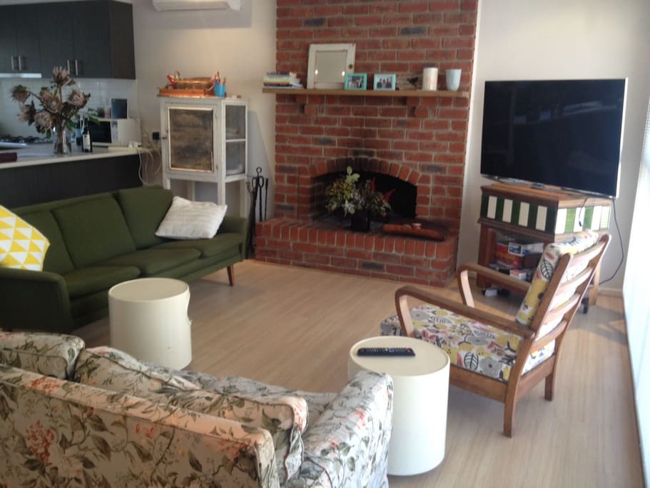 Plenty of room to relax in the living room with 2 large sofas with heater / AC & wood fire