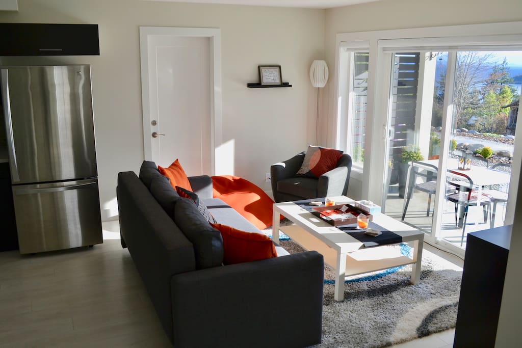 Living room opens to private patio area.