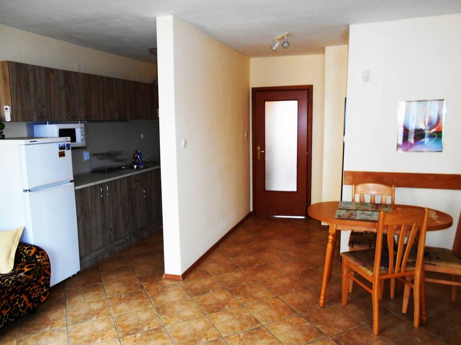 Next to the dining room you will find the kitchen.