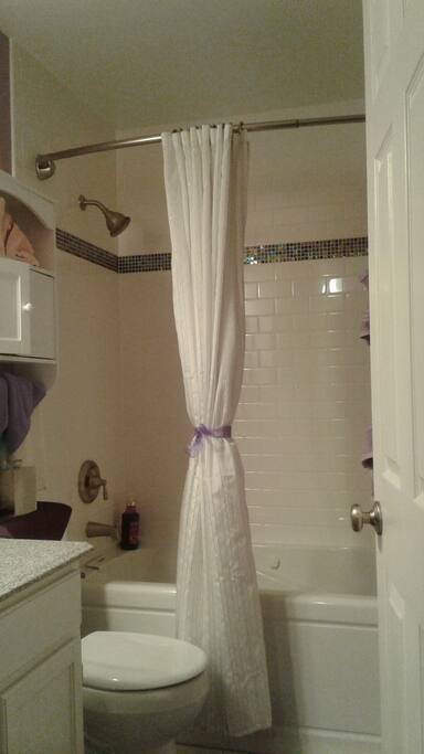 Private bathroom with jetted tub.
