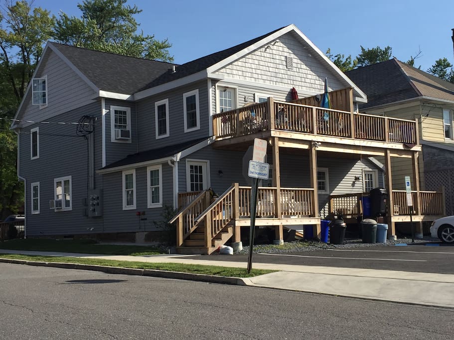 Lower left unit with deck and walk out steps to town