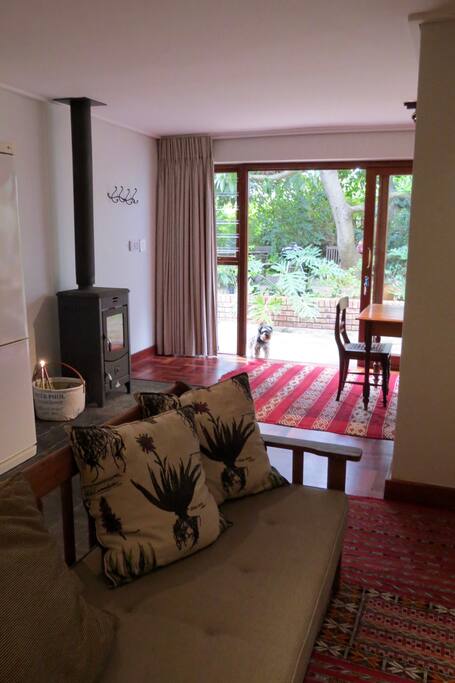 The slow-combustion stove keeps the apartment warm during chilly weather