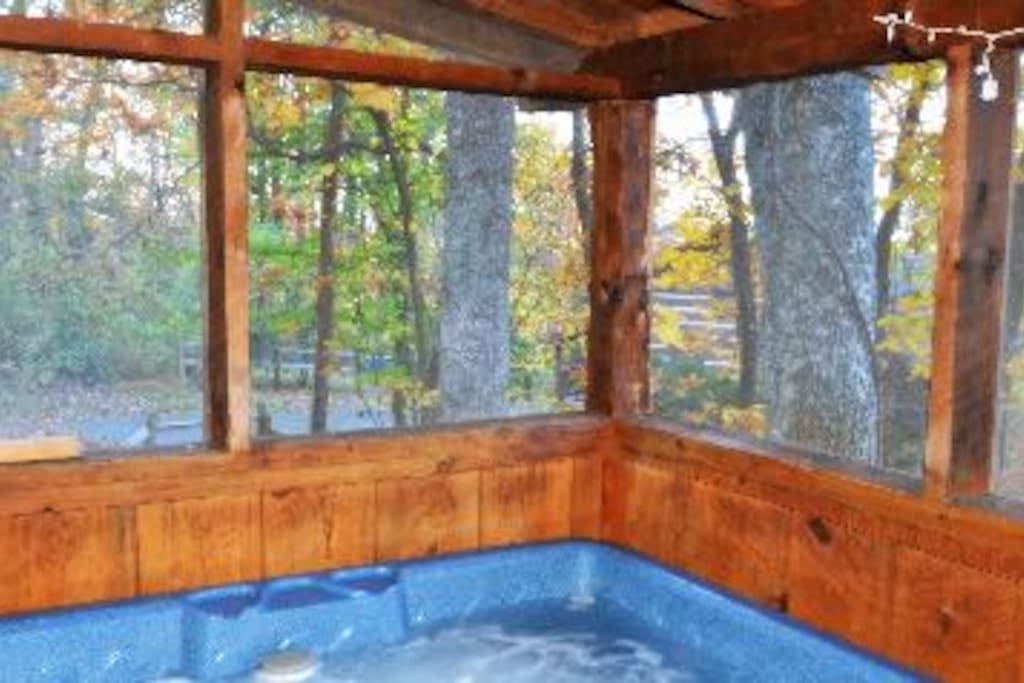 Hot Tub is on screened in porch