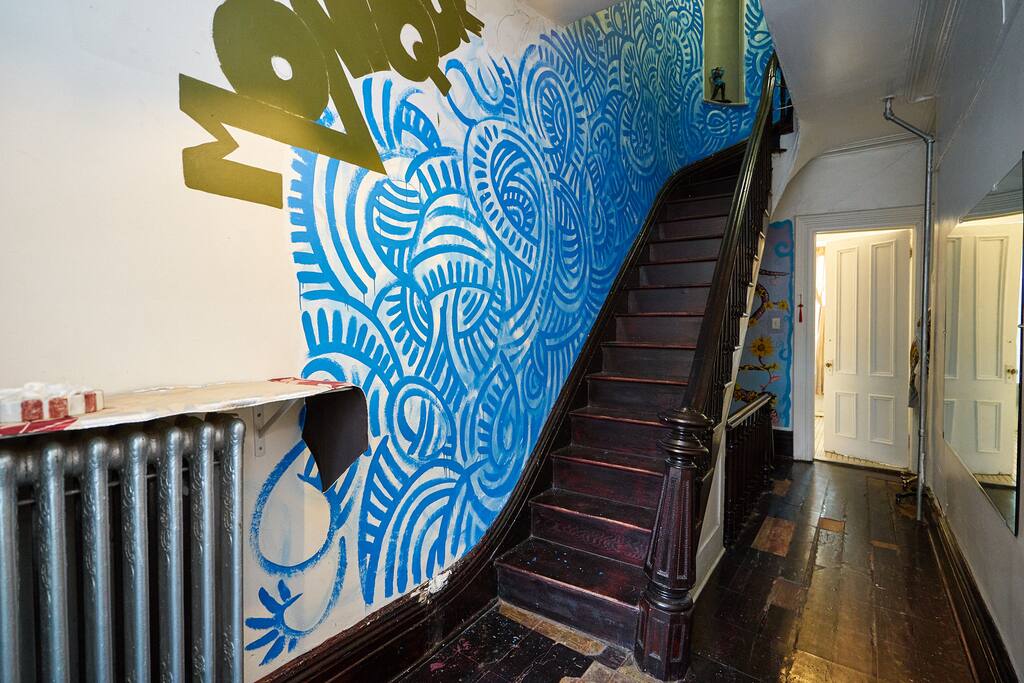 Welcome!. your inside, the door is closed. directly up the steps is your apartment. The hallway to the right is the rest of the house.