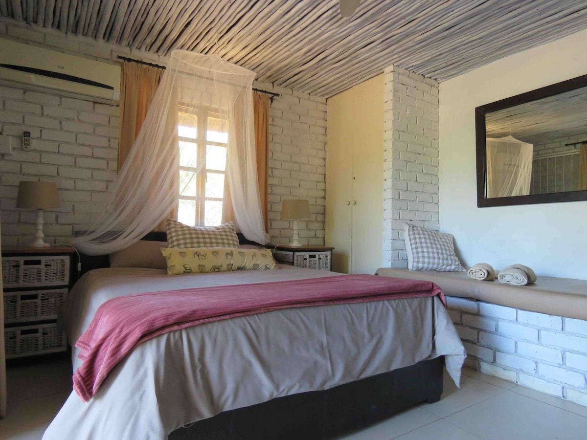 Dormitorio principal que conduce a la terraza principal