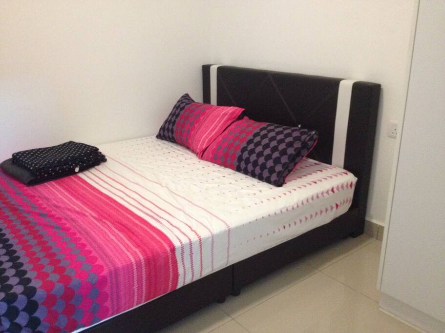 Third bedroom with ceiling fan, air-cond and a queen size bed.