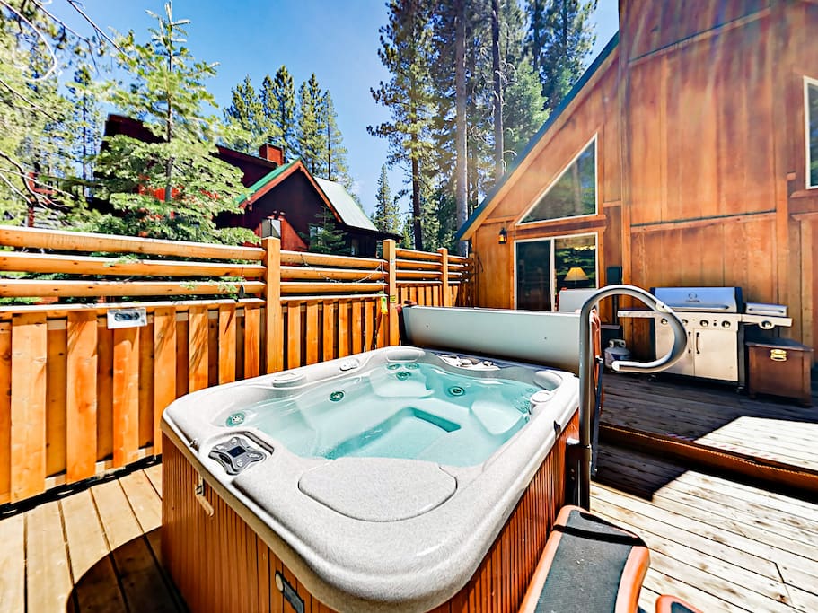 Enjoy a relaxing soak in the private hot tub.