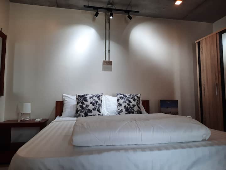 Bedroom located on the floor.