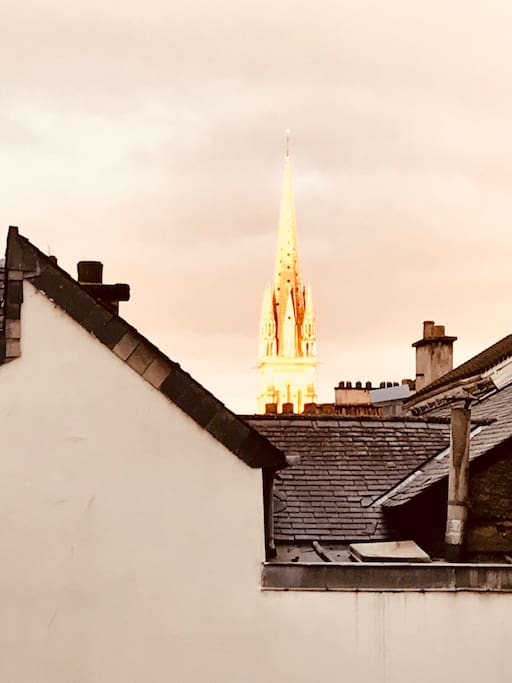 An amazing ray of gold on the spire of Eglise St Martin this morning! A zoomed in view from the bedroom window