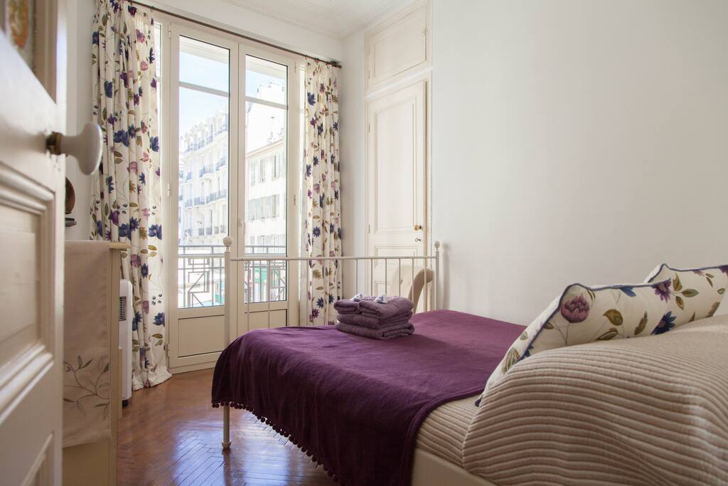 Beautiful airy room with space for travel cot which is available for guests.