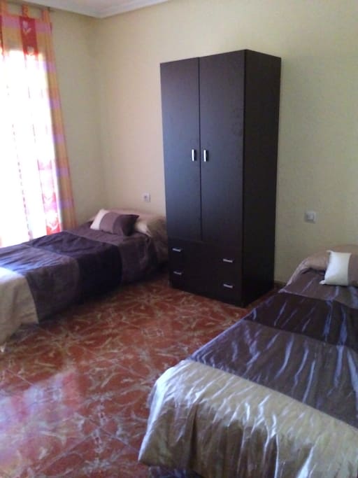 Chambre avec lits d'appoint