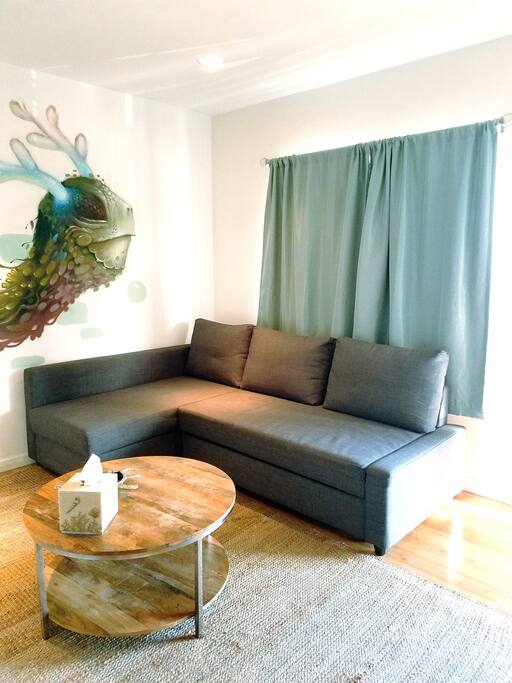 This is a full size pull out sofa bed. Extra bedding is stored in the chaise