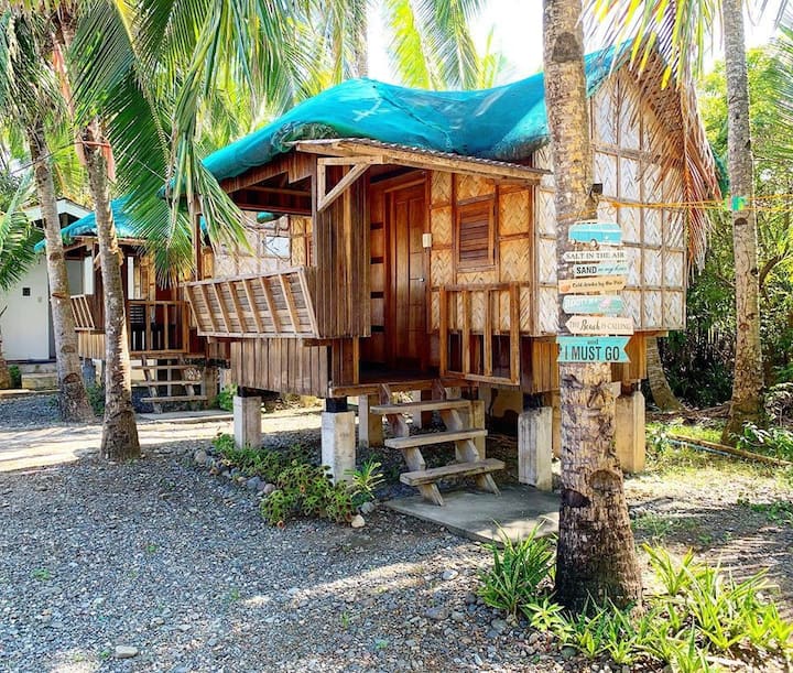 Nipa hut.

Fits 5 comfortably. Has its own private bathroom with shower.